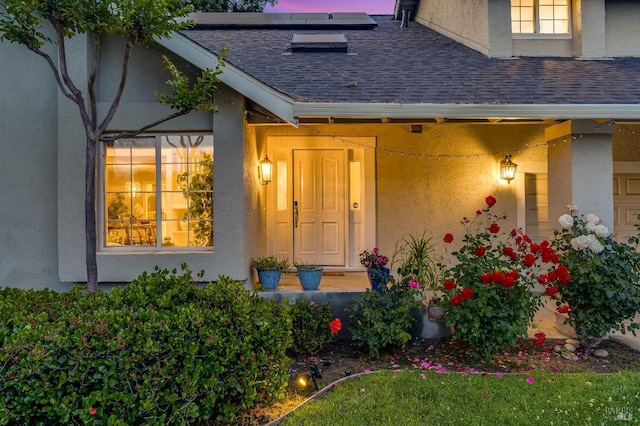 587 El Capitan Dr, Danville, CA 94526 - property entrance with a shingled roof, roof mounted solar panels, and stucco siding