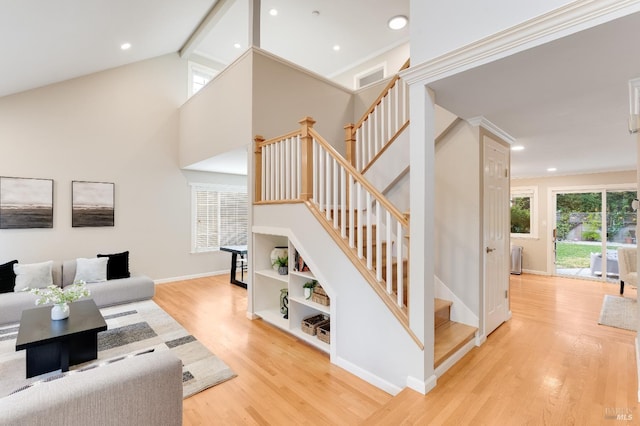 587 El Capitan Dr, Danville, CA 94526 - living area with light wood-style flooring, stairway, high vaulted ceiling, baseboards, and recessed lighting