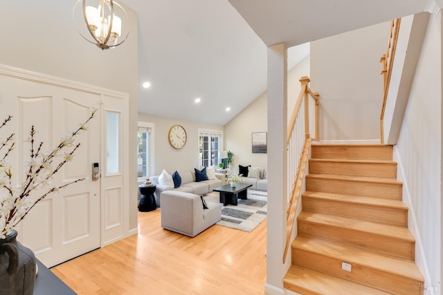 587 El Capitan Dr, Danville, CA 94526 - foyer with stairway, wood finished floors, recessed lighting, high vaulted ceiling, and a chandelier