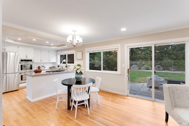 587 El Capitan Dr, Danville, CA 94526 - dining area featuring ornamental molding, a chandelier, light wood-type flooring, recessed lighting, and baseboards