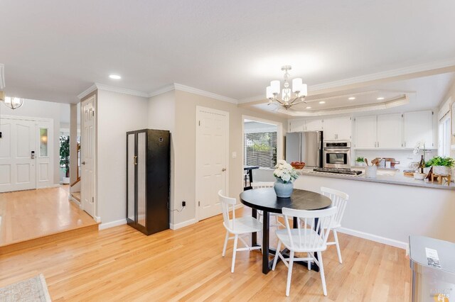 587 El Capitan Dr, Danville, CA 94526 - dining area with a chandelier, light wood-type flooring, ornamental molding, recessed lighting, and baseboards