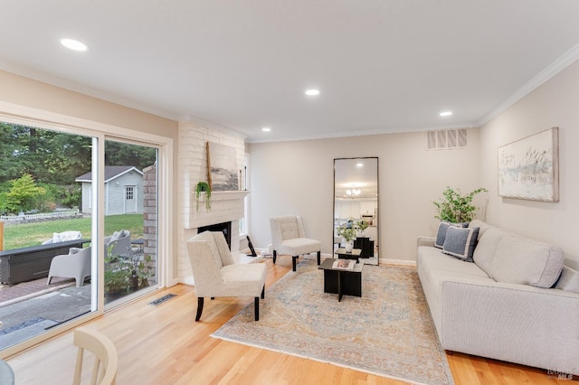 587 El Capitan Dr, Danville, CA 94526 - living room featuring light wood-style flooring, ornamental molding, recessed lighting, a fireplace, and baseboards