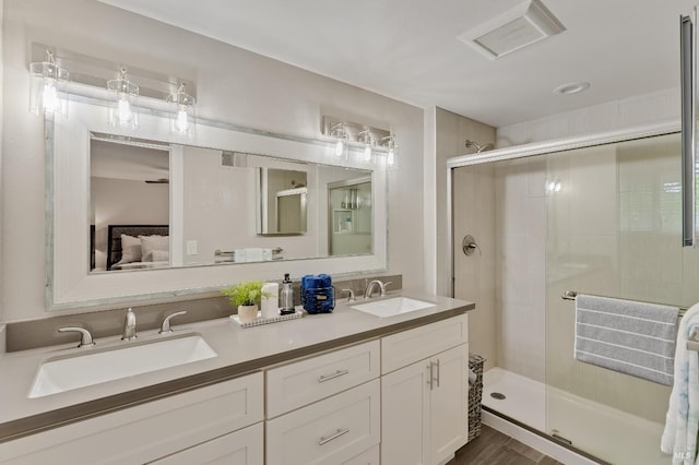 587 El Capitan Dr, Danville, CA 94526 - full bath with a stall shower, double vanity, ensuite bathroom, and wood finished floors