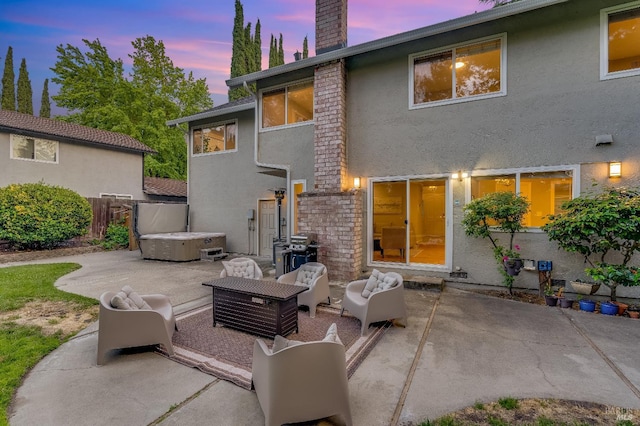 587 El Capitan Dr, Danville, CA 94526 - back of property with a patio, a chimney, stucco siding, and a hot tub