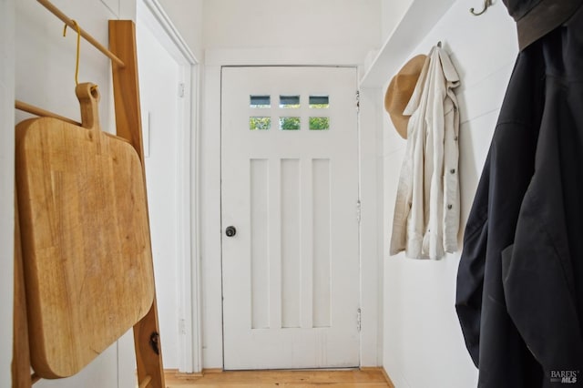 doorway with wood finished floors