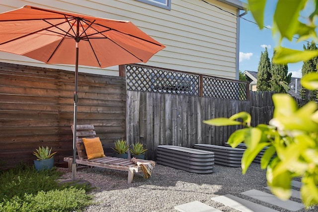 view of patio / terrace with fence