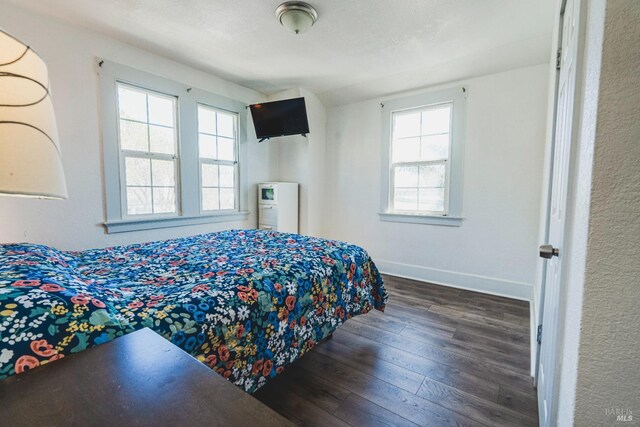 7 Sims Ave, Vallejo, CA 94590 - bedroom with dark wood-type flooring and baseboards