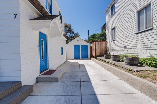 7 Sims Ave, Vallejo, CA 94590 - view of property exterior featuring a storage shed, an outbuilding, and fence