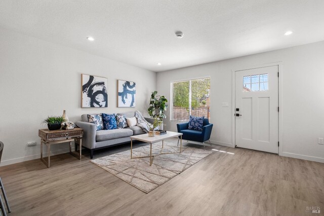 513 Verde Ave, Richmond, CA 94801 - living area with light wood-style floors, baseboards, and recessed lighting
