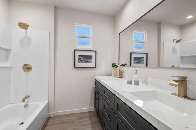513 Verde Ave, Richmond, CA 94801 - bathroom with wood finished floors, healthy amount of natural light, baseboards, and bathing tub / shower combination