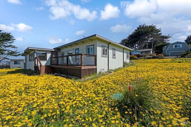 4981 Conch Ave, Bodega Bay, CA 94923 - view of side of home featuring concrete block siding and a wooden deck