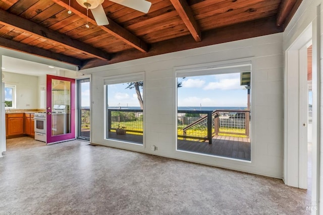 4981 Conch Ave, Bodega Bay, CA 94923 - empty room featuring beam ceiling, healthy amount of natural light, wooden ceiling, and ceiling fan