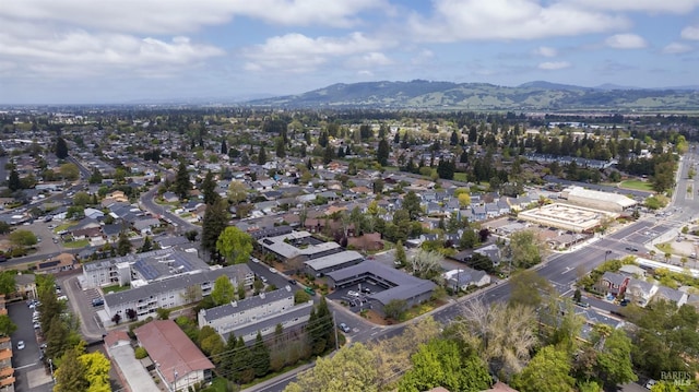 aerial view of property's location with a mountain backdrop