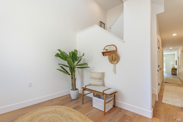 sitting room with wood finished floors, baseboards, and recessed lighting