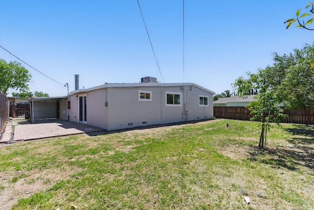back of property featuring crawl space and stucco siding