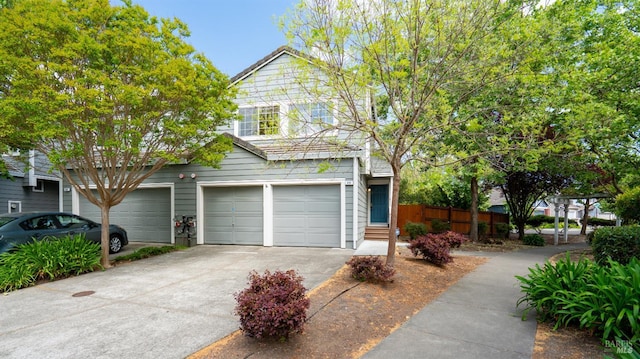 830 Chardonnay Cir, Petaluma, CA 94954 - view of front of property with concrete driveway, an attached garage, and fence