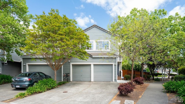 830 Chardonnay Cir, Petaluma, CA 94954 - view of front facade featuring concrete driveway, a garage, and fence