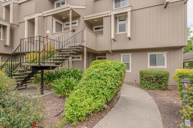 view of home's community with stairway
