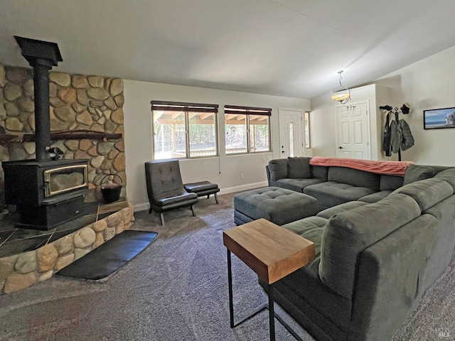 3320 Booth Way, Potter Valley, CA 95469 - carpeted living room featuring baseboards and a wood stove