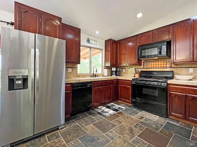 3320 Booth Way, Potter Valley, CA 95469 - kitchen with black appliances, light countertops, decorative backsplash, vaulted ceiling, and recessed lighting