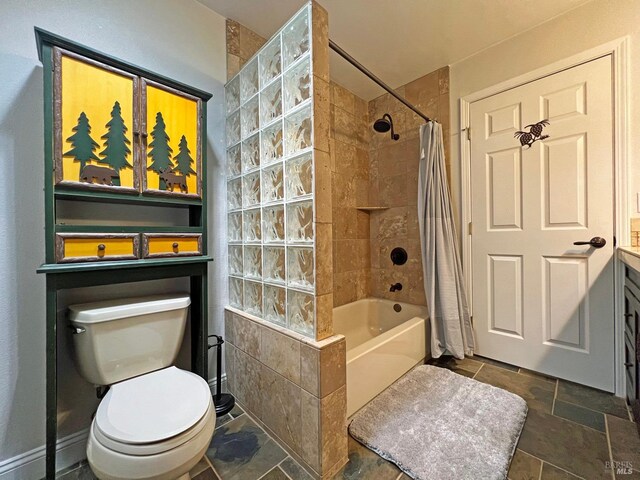 3320 Booth Way, Potter Valley, CA 95469 - full bath featuring toilet, shower / bath combo with shower curtain, and stone finish flooring