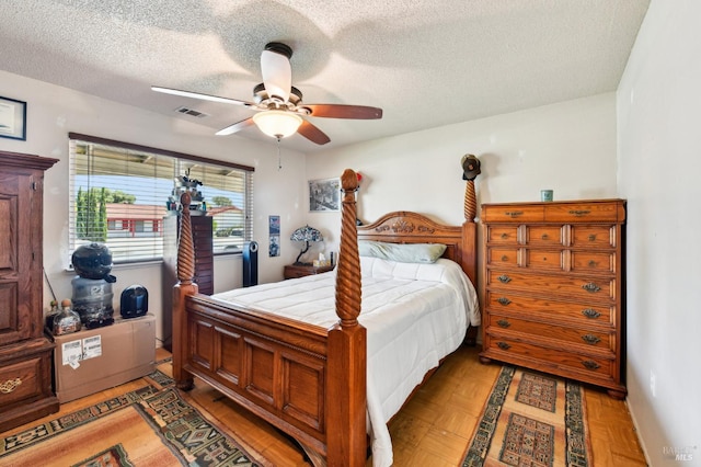 134 Lassen Cir, Vacaville, CA 95687 - bedroom featuring a textured ceiling and a ceiling fan