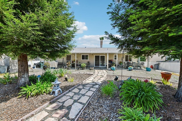134 Lassen Cir, Vacaville, CA 95687 - rear view of property featuring a patio, fence, and stucco siding