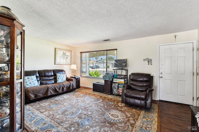 134 Lassen Cir, Vacaville, CA 95687 - living room with wood finished floors and a textured ceiling