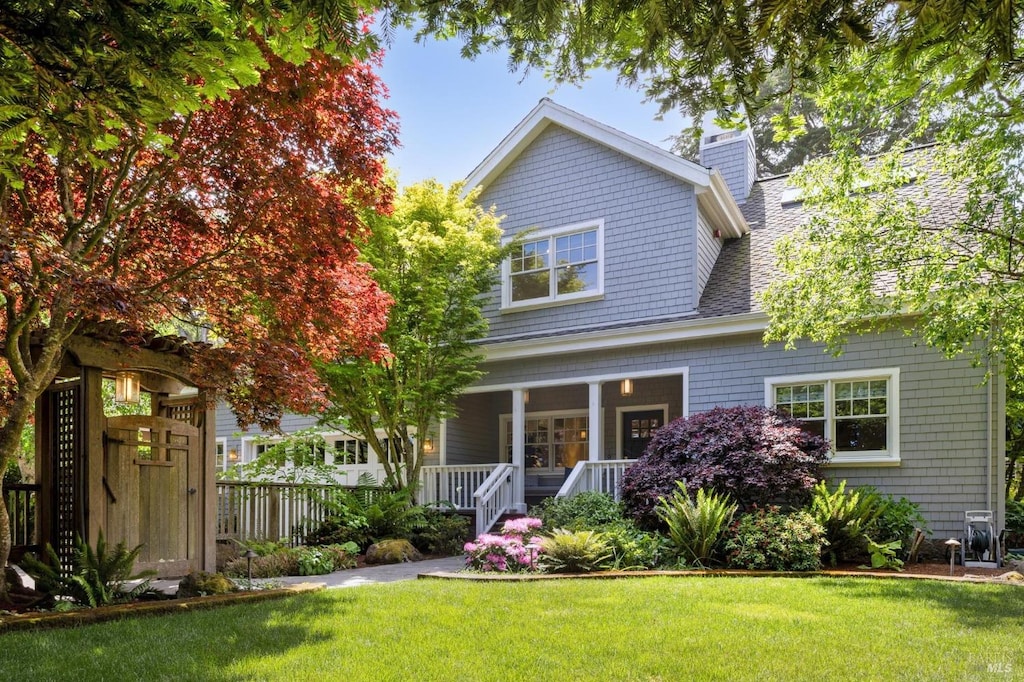 611 Glenwood Ave, Mill Valley, CA 94941 - view of front of house featuring a chimney, a shingled roof, and a porch