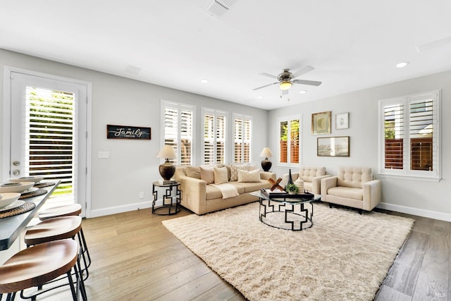 653 Robinson Way, Benicia, CA 94510 - living room featuring baseboards, a ceiling fan, light wood-style floors, and recessed lighting