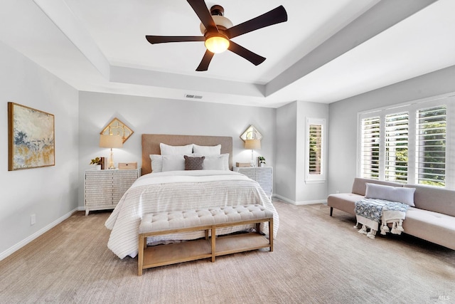 653 Robinson Way, Benicia, CA 94510 - bedroom with a raised ceiling, baseboards, light colored carpet, and ceiling fan