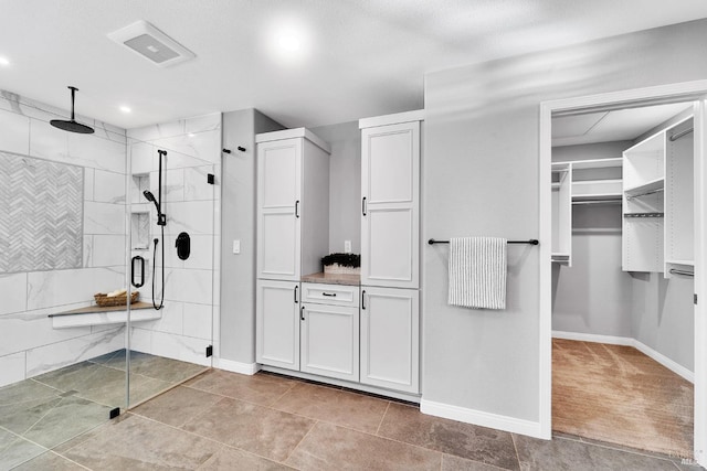 653 Robinson Way, Benicia, CA 94510 - bathroom with baseboards, a stall shower, a closet, and recessed lighting
