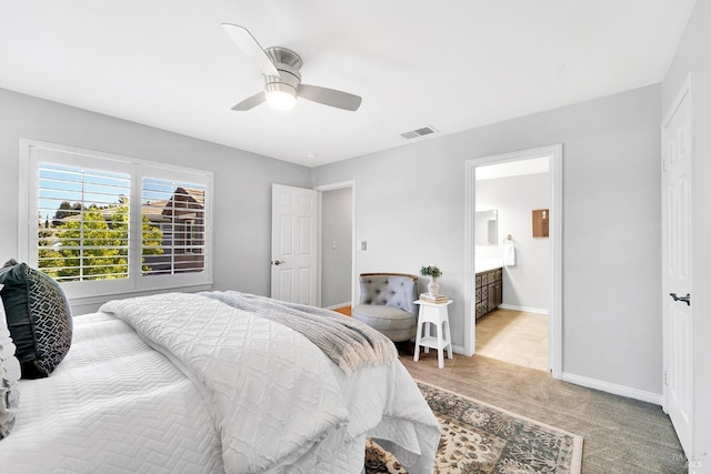 653 Robinson Way, Benicia, CA 94510 - bedroom with a ceiling fan, ensuite bathroom, baseboards, and light carpet