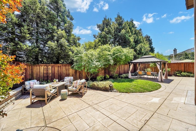 653 Robinson Way, Benicia, CA 94510 - view of patio with a gazebo, an outdoor living space, and a fenced backyard