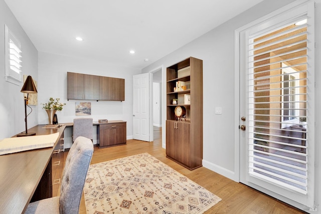 653 Robinson Way, Benicia, CA 94510 - office featuring light wood finished floors, healthy amount of natural light, baseboards, recessed lighting, and built in desk