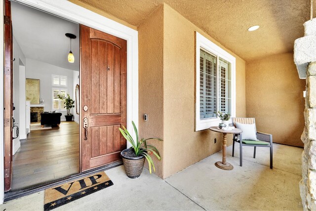 653 Robinson Way, Benicia, CA 94510 - property entrance with stucco siding and a porch