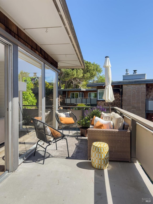 view of patio with a balcony