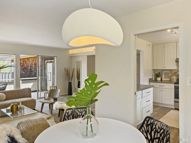 dining room featuring light wood-style floors