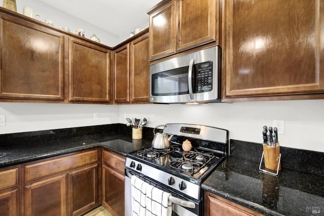 212 Via Del Sol, Vacaville, CA 95687 - kitchen featuring stainless steel appliances and dark stone counters