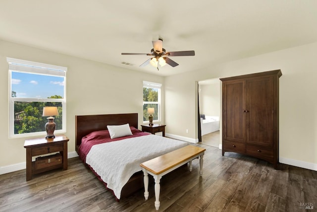 212 Via Del Sol, Vacaville, CA 95687 - bedroom featuring wood finished floors, baseboards, ceiling fan, and connected bathroom