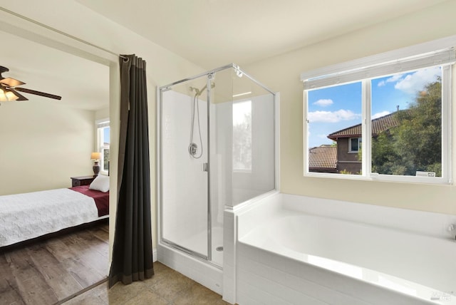 212 Via Del Sol, Vacaville, CA 95687 - ensuite bathroom with a shower stall, a garden tub, and a ceiling fan