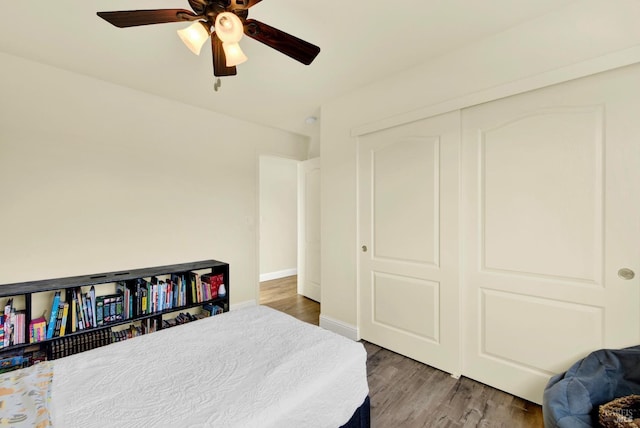 212 Via Del Sol, Vacaville, CA 95687 - bedroom with wood finished floors, ceiling fan, a closet, and baseboards