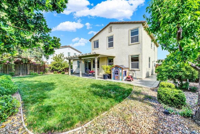 212 Via Del Sol, Vacaville, CA 95687 - back of property with a patio area, stucco siding, and a pergola