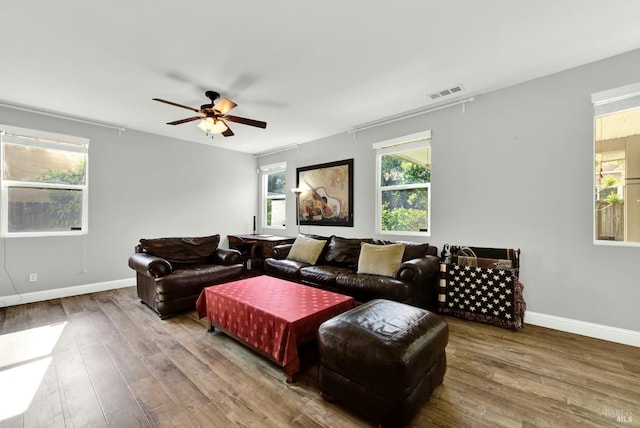 212 Via Del Sol, Vacaville, CA 95687 - living area with wood finished floors, ceiling fan, and plenty of natural light