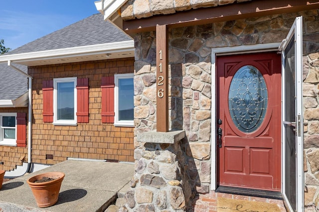 1126 Rimrock Dr, Napa, CA 94558 - view of exterior entry with roof with shingles and stone siding