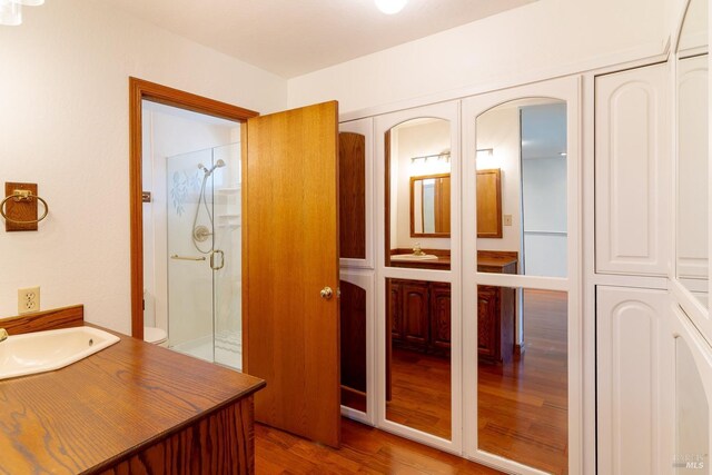 3756 Cano Ct, Napa, CA 94558 - full bathroom with a shower stall, wood finished floors, and vanity