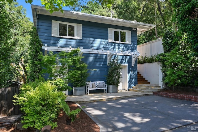 5 Greenfield Ct, San Anselmo, CA 94960 - view of front of home with stairs, a patio area, and fence