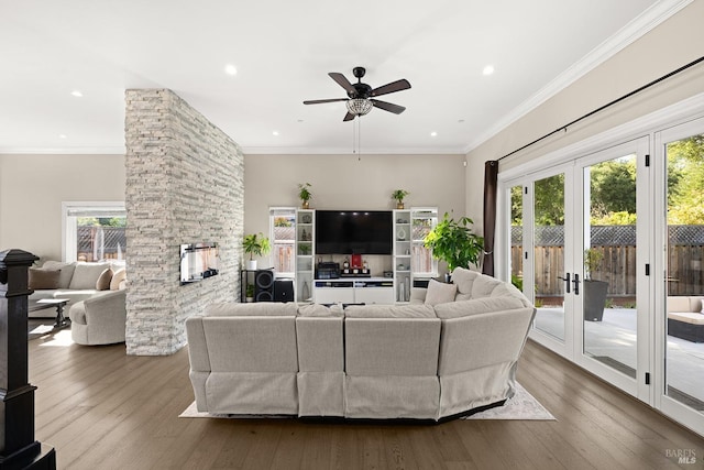 169 Pacific Heights Dr, Santa Rosa, CA 95403 - living area featuring a ceiling fan, a stone fireplace, dark wood-type flooring, recessed lighting, and french doors