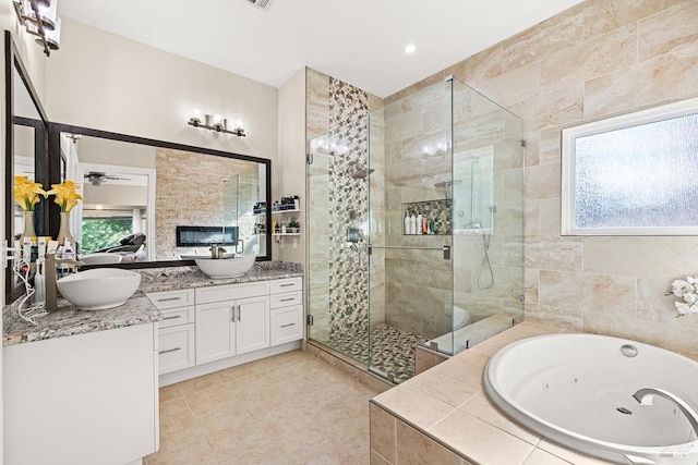 169 Pacific Heights Dr, Santa Rosa, CA 95403 - full bath with a shower stall, a whirlpool tub, double vanity, tile patterned flooring, and ceiling fan