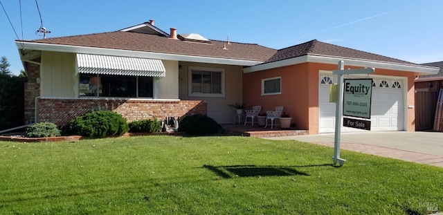 2324 W Park Ave, Napa, CA 94558 - back of house with driveway, a yard, a garage, brick siding, and roof with shingles